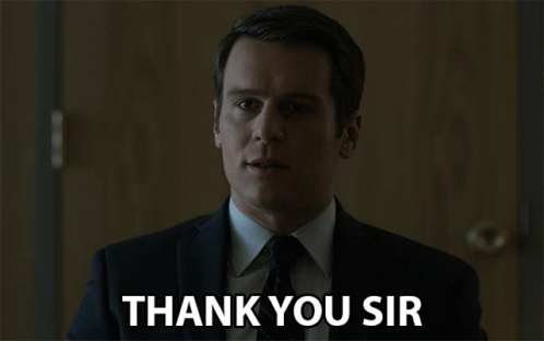 a man in a suit and tie is saying " thank you sir "