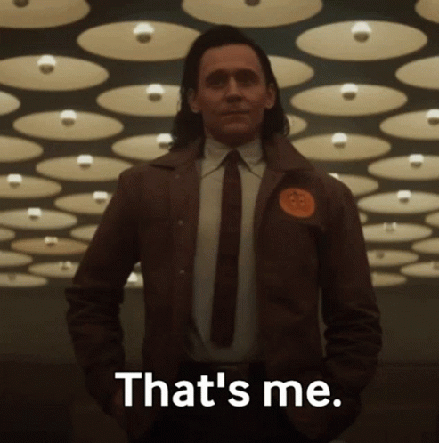 A Man In A Suit And Tie Is Saying That 'S Me . GIF