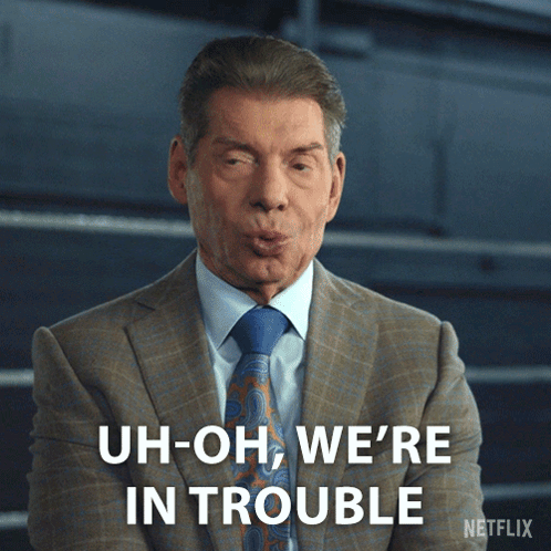 A Man In A Suit And Tie Is Saying " Uh-Oh We 'Re In Trouble " GIF