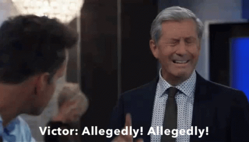 A Man In A Suit And Tie Is Saying Victor Allegedly GIF