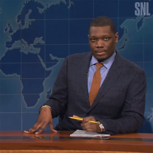 A Man In A Suit And Tie Is Saying " We 'Ll See What Happens " GIF
