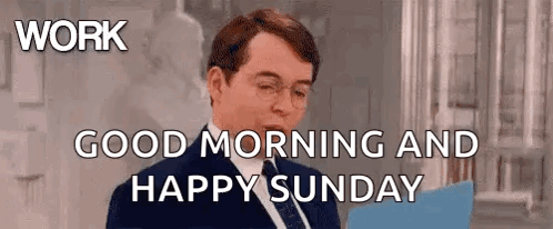 A Man In A Suit And Tie Is Saying `` Work Good Morning And Happy Sunday '' While Holding A Clipboard . GIF