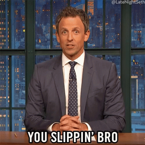 A Man In A Suit And Tie Is Saying " You Slippin ' Bro " GIF