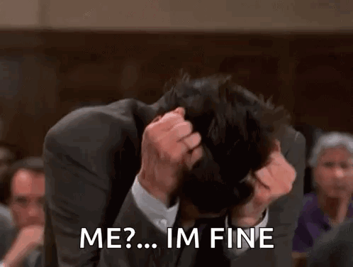 A Man In A Suit And Tie Is Scratching His Head And Saying `` Me ? ... Im Fine '' . GIF