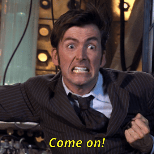 A Man In A Suit And Tie Is Screaming With The Words Come On Written Below Him GIF