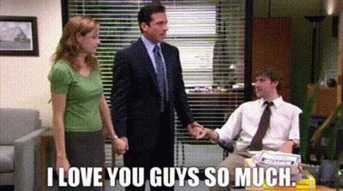 A Man In A Suit And Tie Is Shaking Hands With A Woman And A Man In A Shirt And Tie . GIF