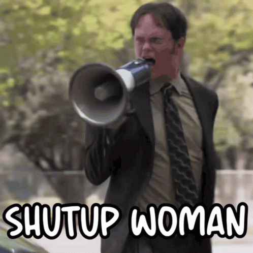 A Man In A Suit And Tie Is Shouting Into A Megaphone With The Words Shutup Woman Above Him GIF