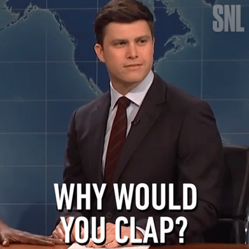A Man In A Suit And Tie Is Sitting At A Desk And Says " Why Would You Clap " GIF
