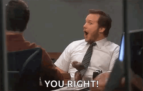A Man In A Suit And Tie Is Sitting At A Desk Talking To Another Man And Says `` You Right '' . GIF
