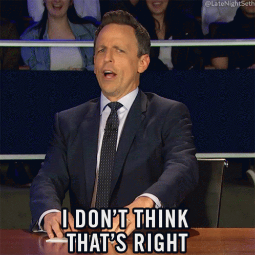 A Man In A Suit And Tie Is Sitting At A Table And Says I Don 'T Think That 'S Right GIF