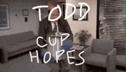 A Man In A Suit And Tie Is Sitting In A Waiting Room With The Words Todd Cup Hopes Written On The Bottom GIF
