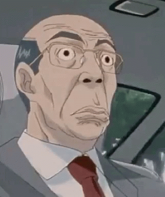 A Man In A Suit And Tie Is Sitting In The Back Seat Of A Car Making A Funny Face . GIF