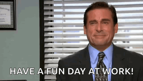 A Man In A Suit And Tie Is Smiling And Saying `` Have A Fun Day At Work '' . GIF
