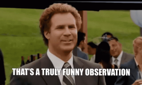 A Man In A Suit And Tie Is Smiling And Saying That 'S A Truly Funny Observation . GIF