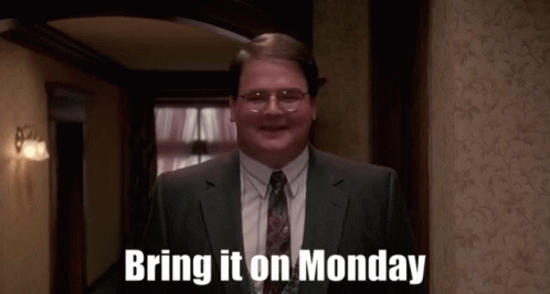 A Man In A Suit And Tie Is Smiling And Says Bring It On Monday . GIF