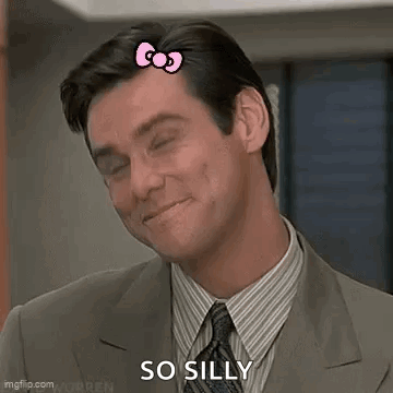 Man In Suit Smiling With Hello Kitty Hair Clip GIF