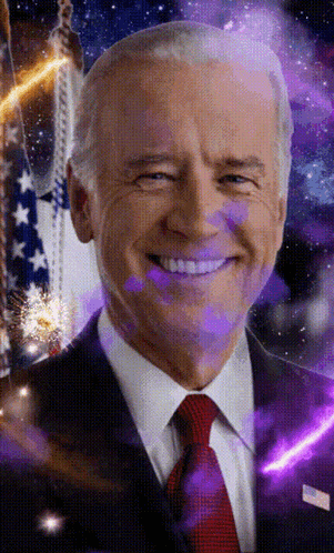 A Man In A Suit And Tie Is Smiling In Front Of A Purple Background GIF
