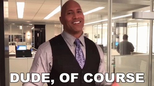 A Man In A Suit And Tie Is Smiling With The Words Dude Of Course Below Him GIF
