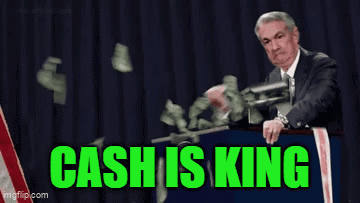 A Man In A Suit And Tie Is Standing At A Podium With Money Falling Around Him And The Words Cash Is King Written In Gree GIF
