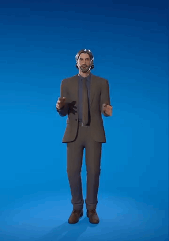 A Man In A Suit And Tie Is Standing In Front Of A Blue Background . GIF