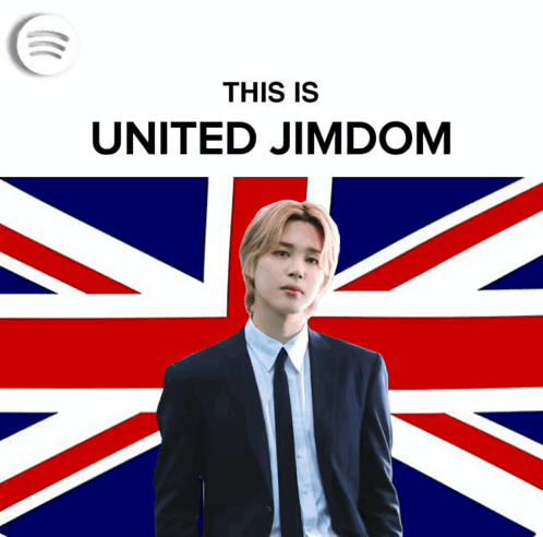 A Man In A Suit And Tie Is Standing In Front Of A British Flag With The Words " This Is United Jimdom " Above Him GIF