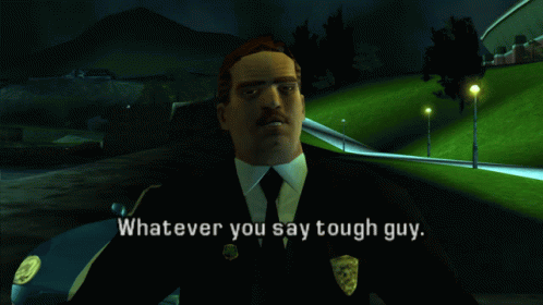 A Man In A Suit And Tie Is Standing In Front Of A Car And Says " Whatever You Say Tough Guy " GIF
