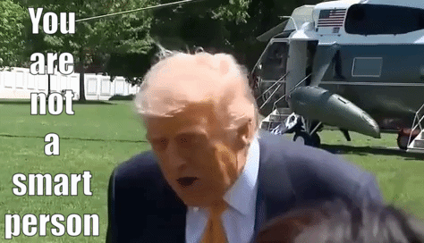 a man in a suit and tie is standing in front of a helicopter with the words `` you are not a smart person '' .