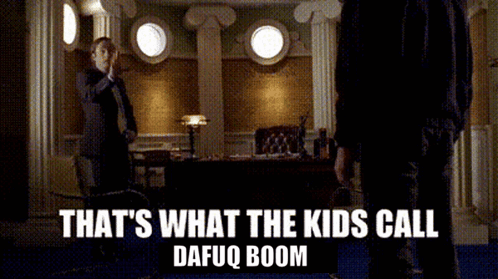 A Man In A Suit And Tie Is Standing In Front Of A Man In A Suit And Tie In A Room . GIF