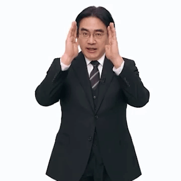 A Man In A Suit And Tie Is Standing In Front Of A Sign That Says Full Focus GIF