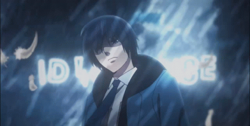 A Man In A Suit And Tie Is Standing In Front Of A Sign That Says Idl02 GIF