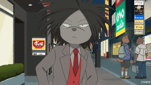 A Man In A Suit And Tie Is Standing In Front Of A Sign That Says Yoko GIF
