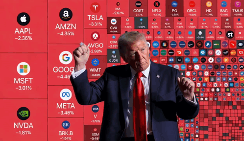 A Man In A Suit And Tie Is Standing In Front Of A Wall Of Stocks Including Amzn GIF