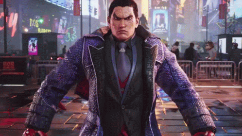 A Man In A Suit And Tie Is Standing In The Middle Of A City Street . GIF