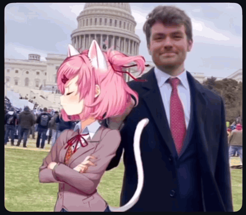 A Man In A Suit And Tie Is Standing Next To A Girl With Pink Hair And Cat Ears GIF