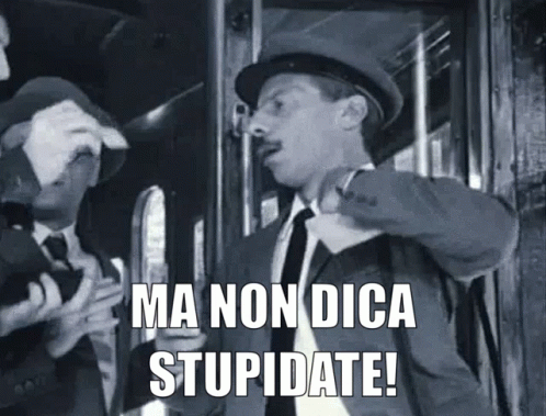 A Man In A Suit And Tie Is Standing Next To Another Man And Says Ma Non Dica Stupidate ! GIF