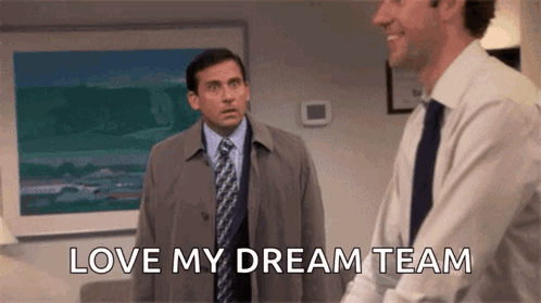 A Man In A Suit And Tie Is Standing Next To Another Man In A Suit And Tie And Says `` Love My Dream Team '' . GIF