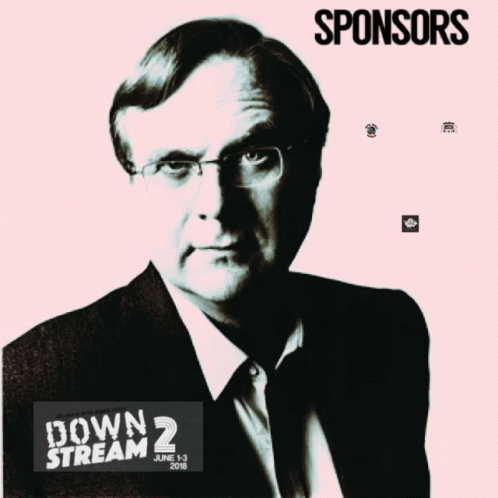 A Man In A Suit And Tie Is Surrounded By Sponsors Such As Nacho Mama 'S Tamales And Seattle Superfriends GIF