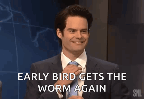 A Man In A Suit And Tie Is Talking About Early Bird Gets The Worm Again GIF