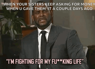 A Man In A Suit And Tie Is Talking About Fighting For Money . GIF