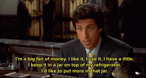 A Man In A Suit And Tie Is Talking About Money GIF