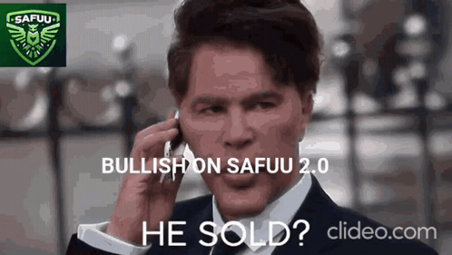 A Man In A Suit And Tie Is Talking On A Cell Phone With The Words Bullish On Safuu 2.0 He Sold . GIF