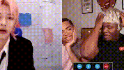 A Man In A Suit And Tie Is Talking On A Video Call With Another Man . GIF