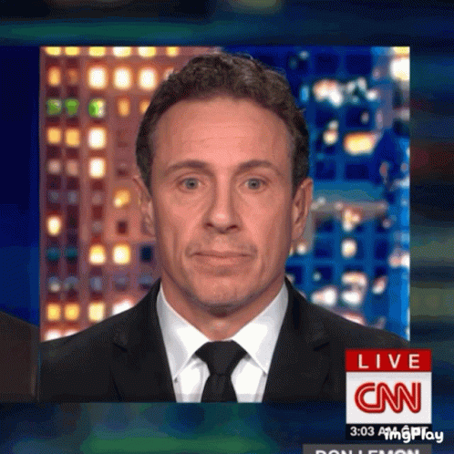 A Man In A Suit And Tie Is Talking On Cnn Live GIF