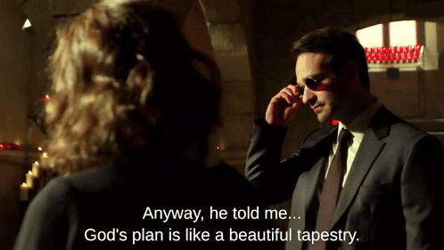 A Man In A Suit And Tie Is Talking To A Woman And The Tragedy Of Being Human GIF