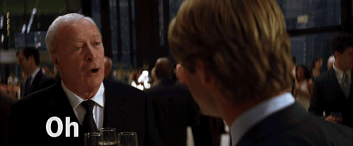 A Man In A Suit And Tie Is Talking To Another Man With The Words Oh You Have No Idea Below Him GIF