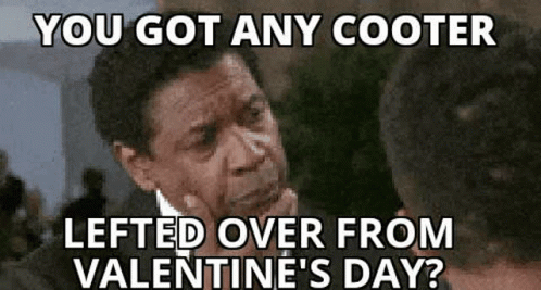 A Man In A Suit And Tie Is Thinking About Valentine 'S Day And Has Left Over From Valentine 'S Day ? GIF