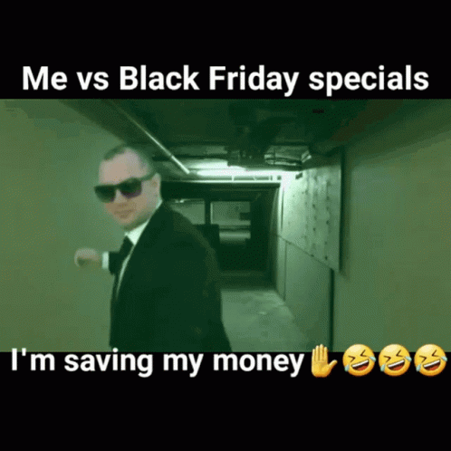 A Man In A Suit And Tie Is Walking Down A Hallway In A Meme About Black Friday Specials GIF