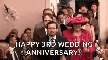A Man In A Suit And Tie Is Walking Down The Aisle At A Wedding Ceremony . GIF