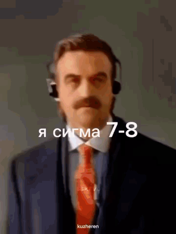 A Man In A Suit And Tie Is Wearing A Headset And The Number 7-8 Is Above Him GIF