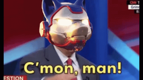 A Man In A Suit And Tie Is Wearing A Robotic Mask And Says C Mon Man GIF